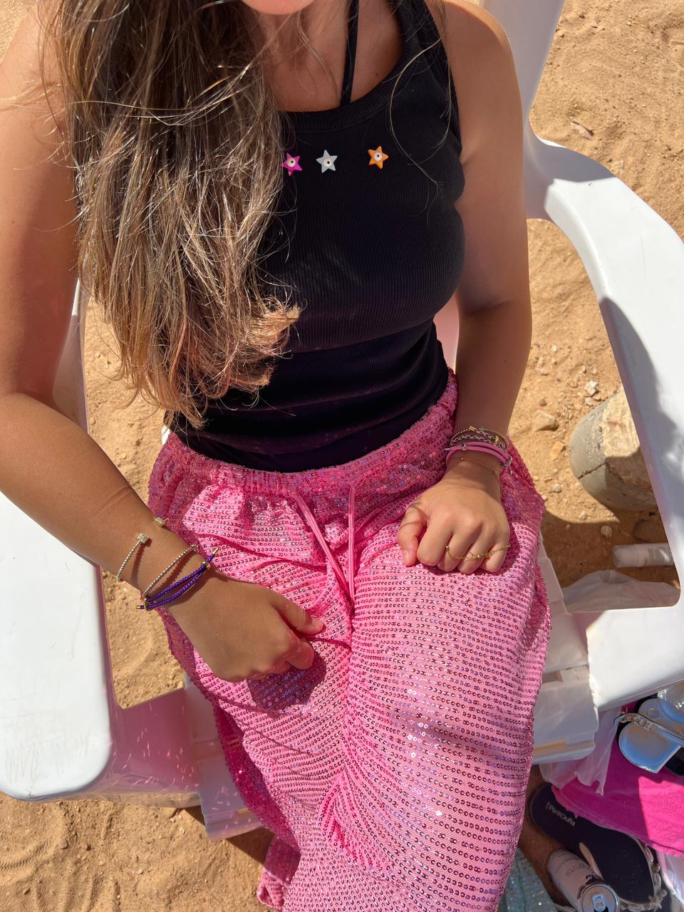 black tank top with toys