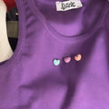 purple tank top with toys